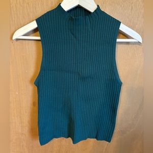 Lucy Paris sleeveless turtleneck